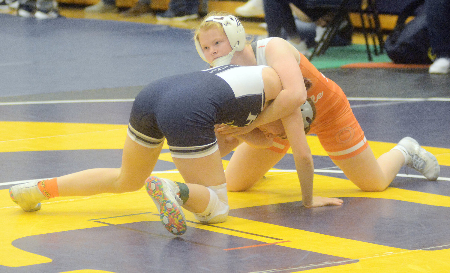 Liz Adams (above) looks to circle around a Francis Howell Central wrestler during the Wonder Woman Tournament at Battle High School in Columbia back in late December. Adams and her fellow Owensville High School (OHS) wrestlers went for individual and team (Four Rivers) conference titles yesterday (Tuesday) during the annual FRC Tournament at St. Clair High School.